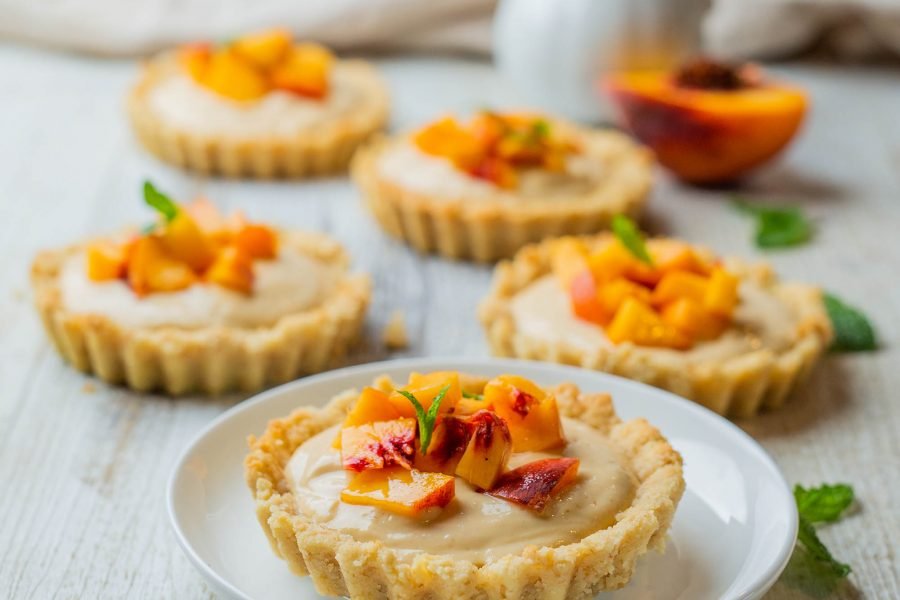 Vegan mini peach custard tarts